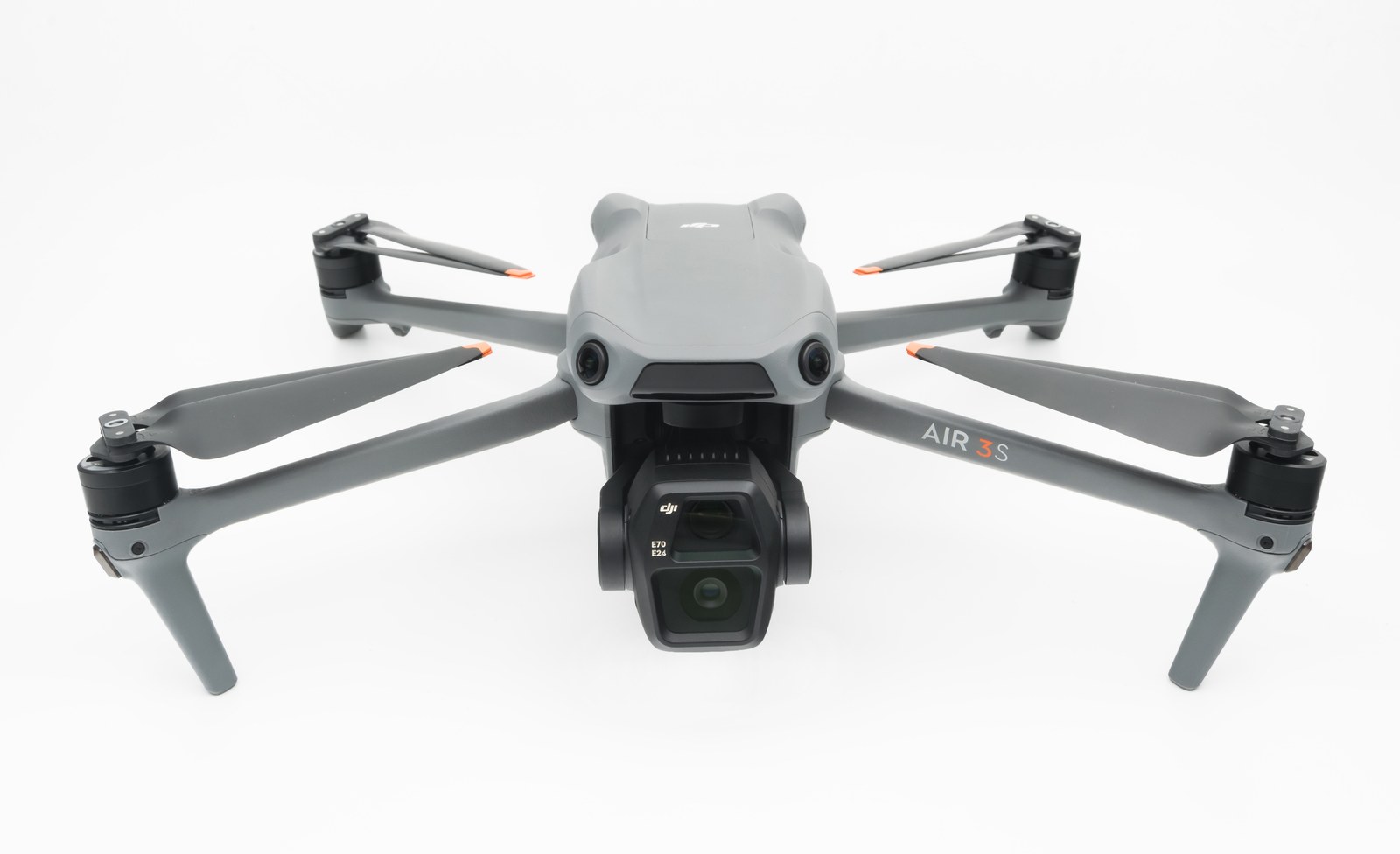 DJI Air 3S drone unfolded facing the camera, dual-camera gimbal and AIR 3S lettering visible on its arm