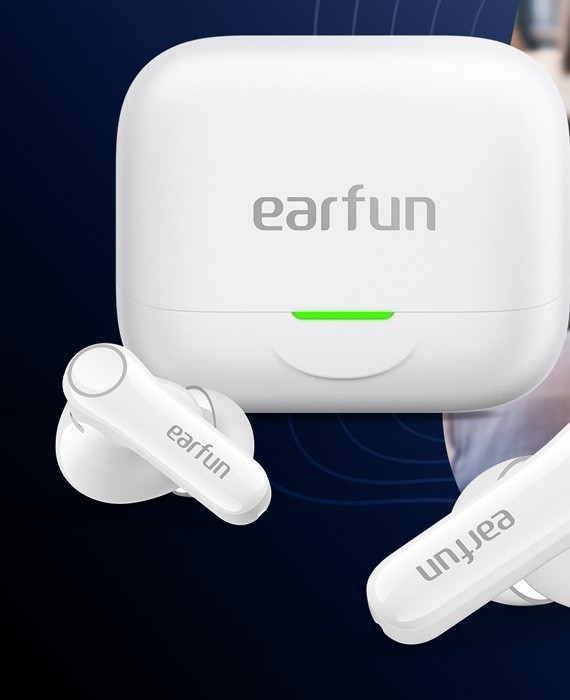 EarFun Air Pro 4+ white earbuds next to their charging case with green status light