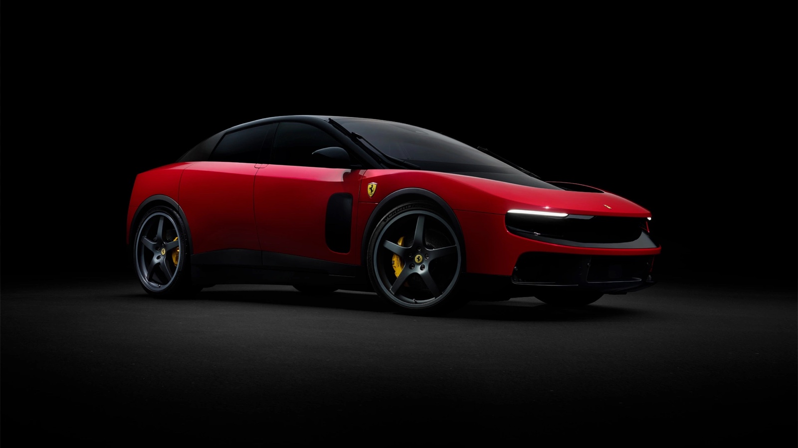 Red Ferrari Luce electric car in a dark studio, front three-quarter view