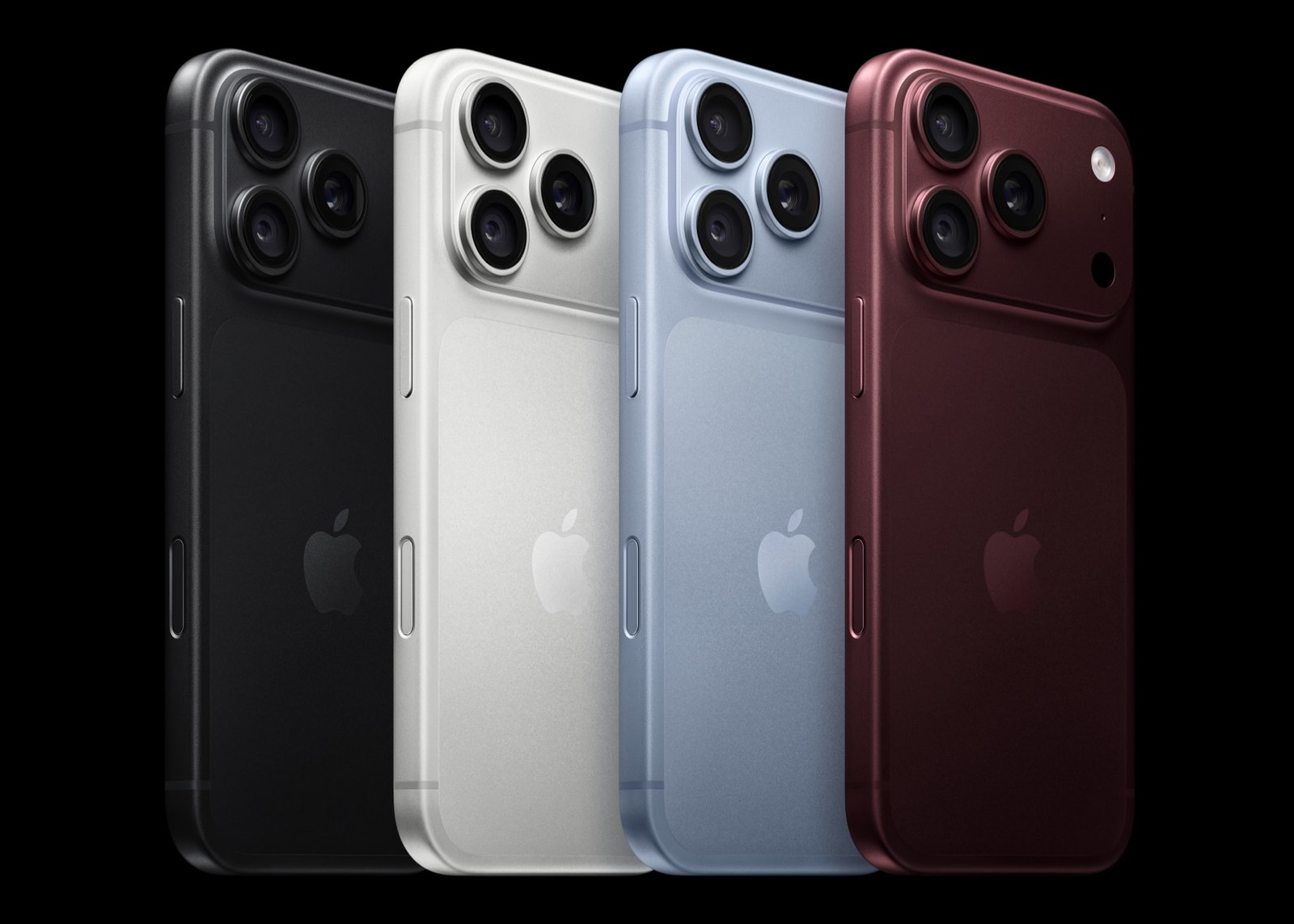 Four iPhone 18 Pro phones from the back in black, silver, glacier and burgundy, fanned out against a black background